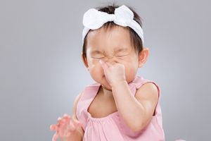 Babies typically don't suffer from hay fever, but they can have to deal with dust or pet allergies.